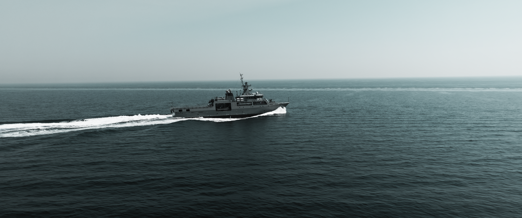 A ship crossing a calm sea