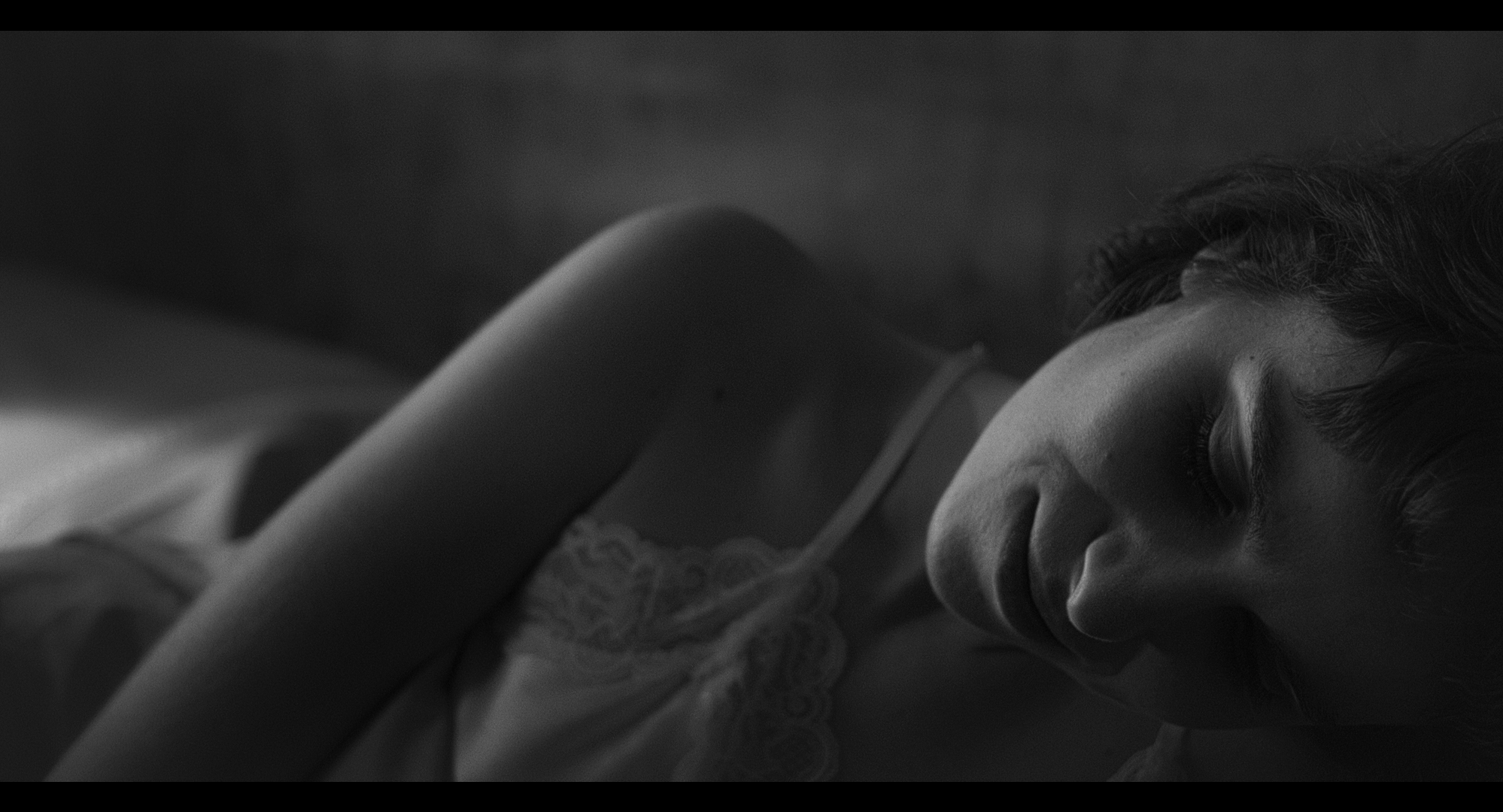 A close-up of a sleeping woman