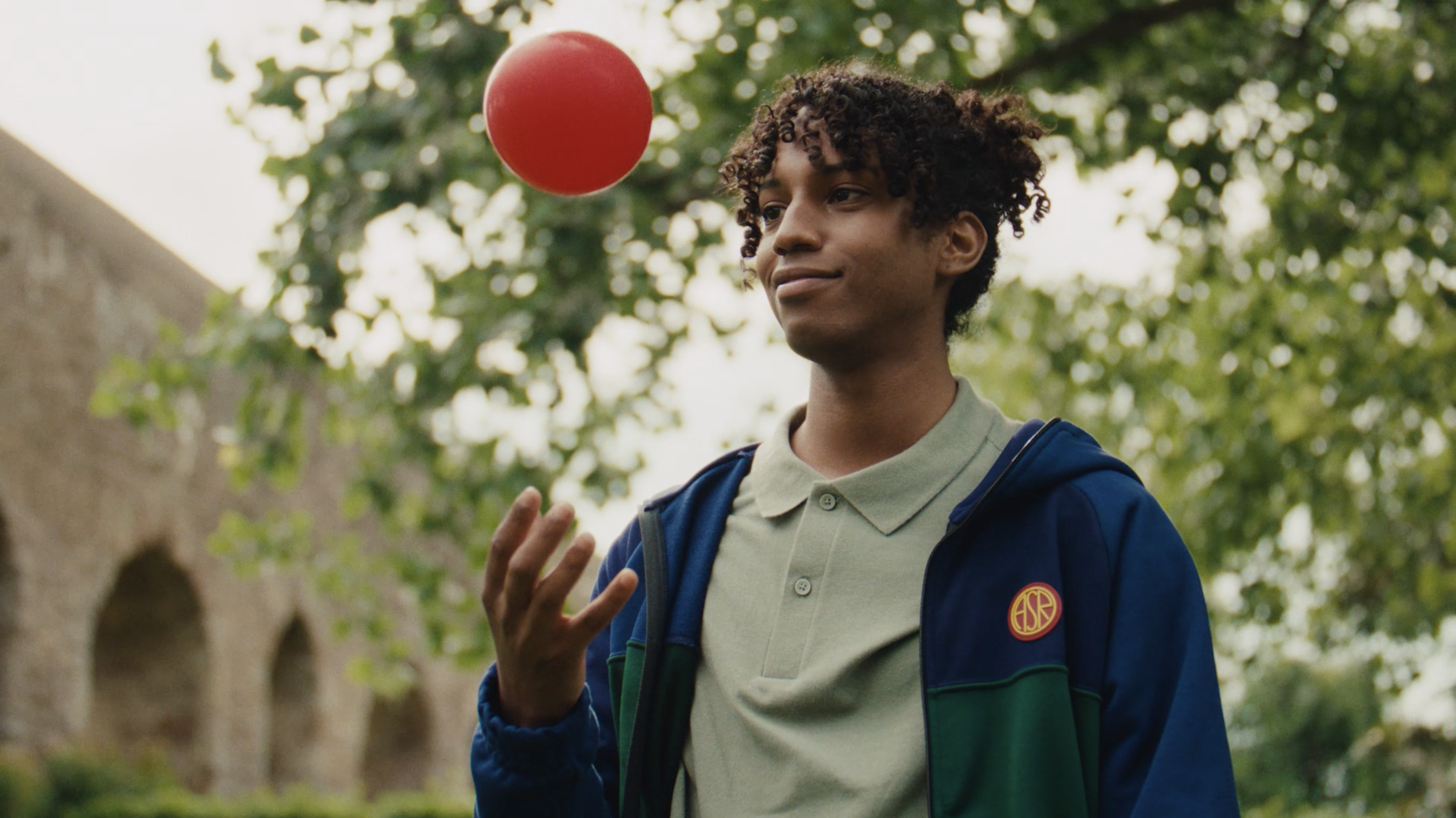 A portrait with a red ball