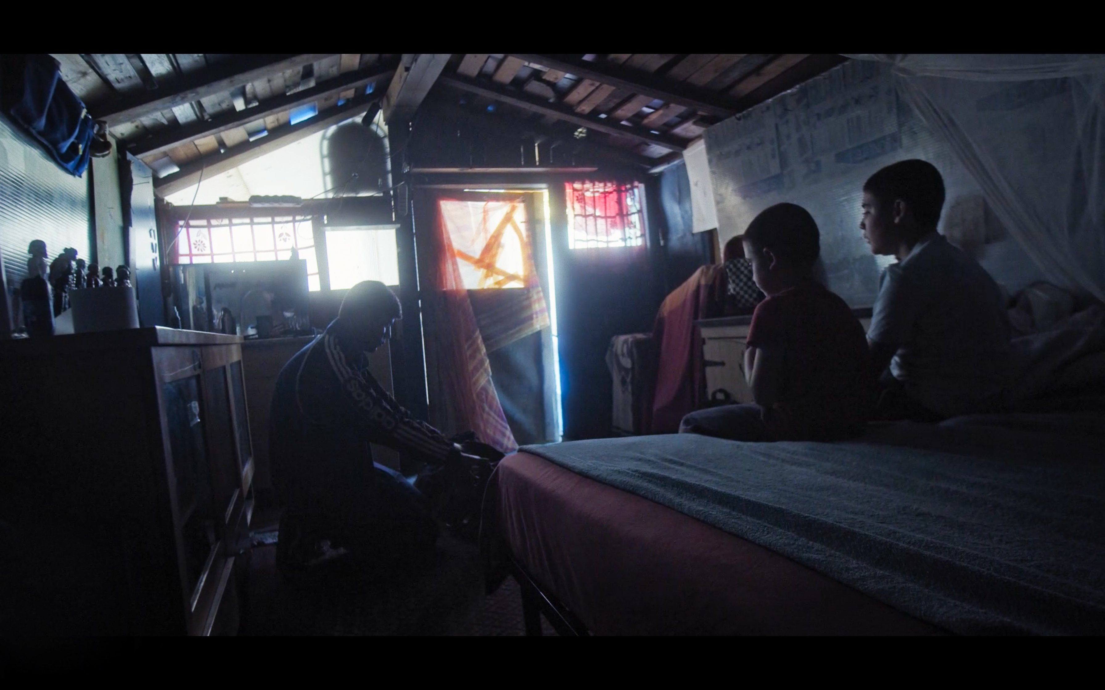 People gathered in a softly lit room