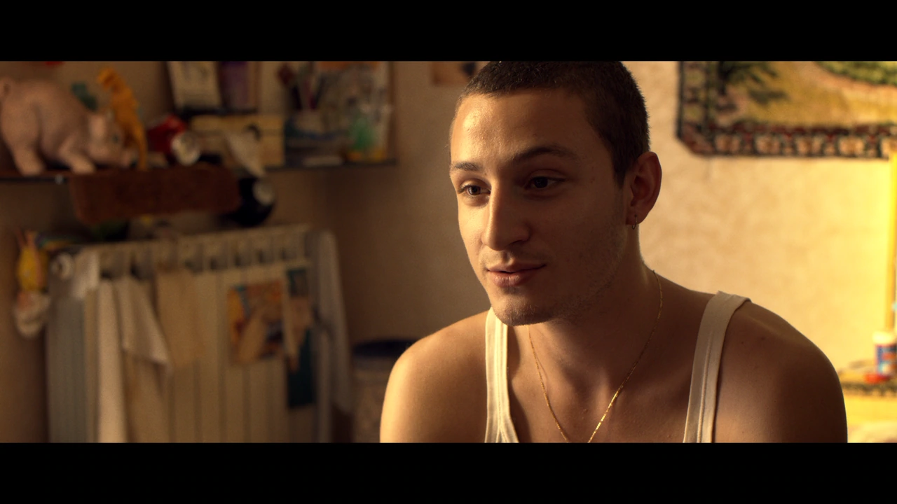 A young man in warm afternoon light