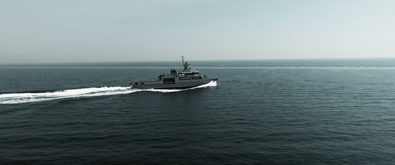 A ship crossing a calm sea
