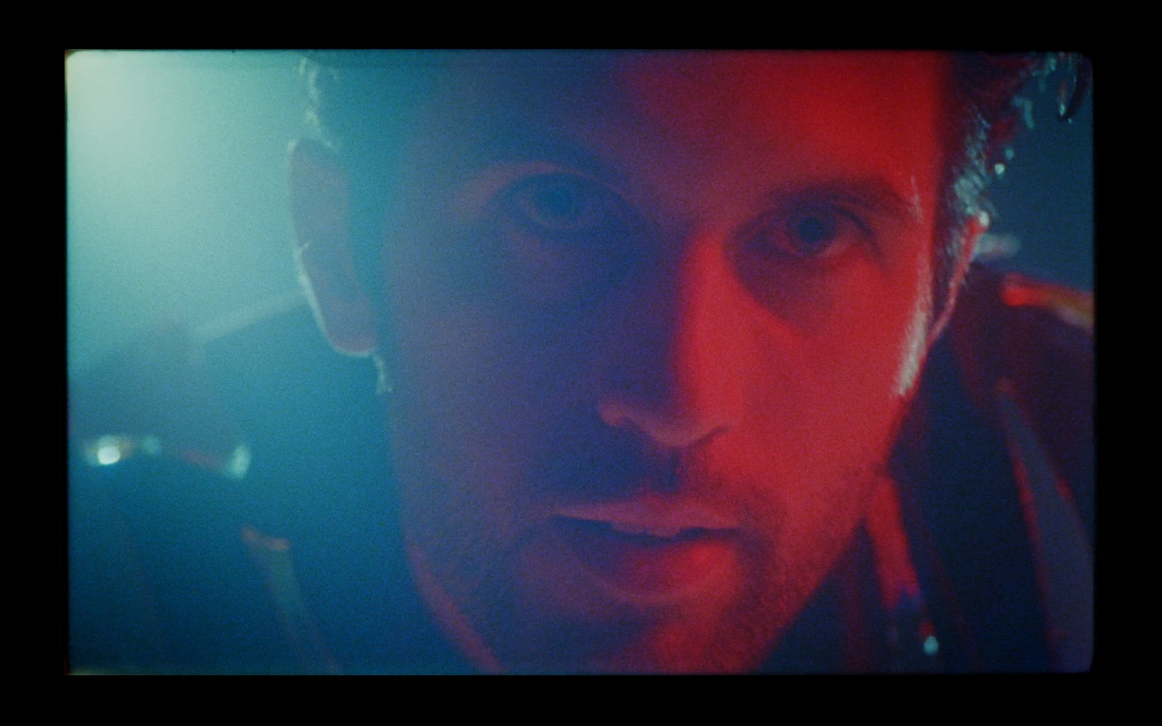 A close-up in cyan and red light