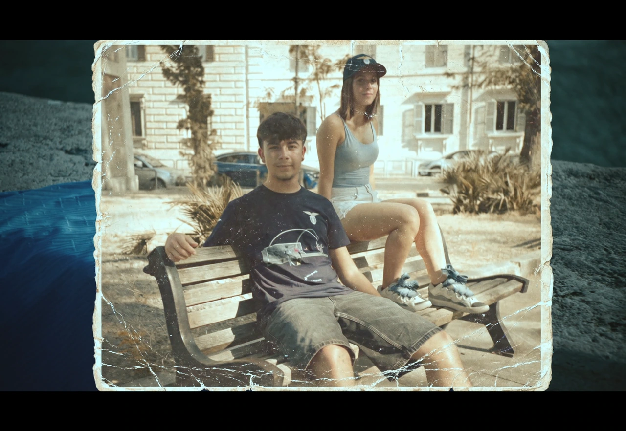 Two SS Lazio supporters sitting on a bench in a printed photograph