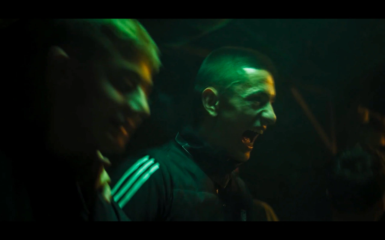 Two people in green light at night