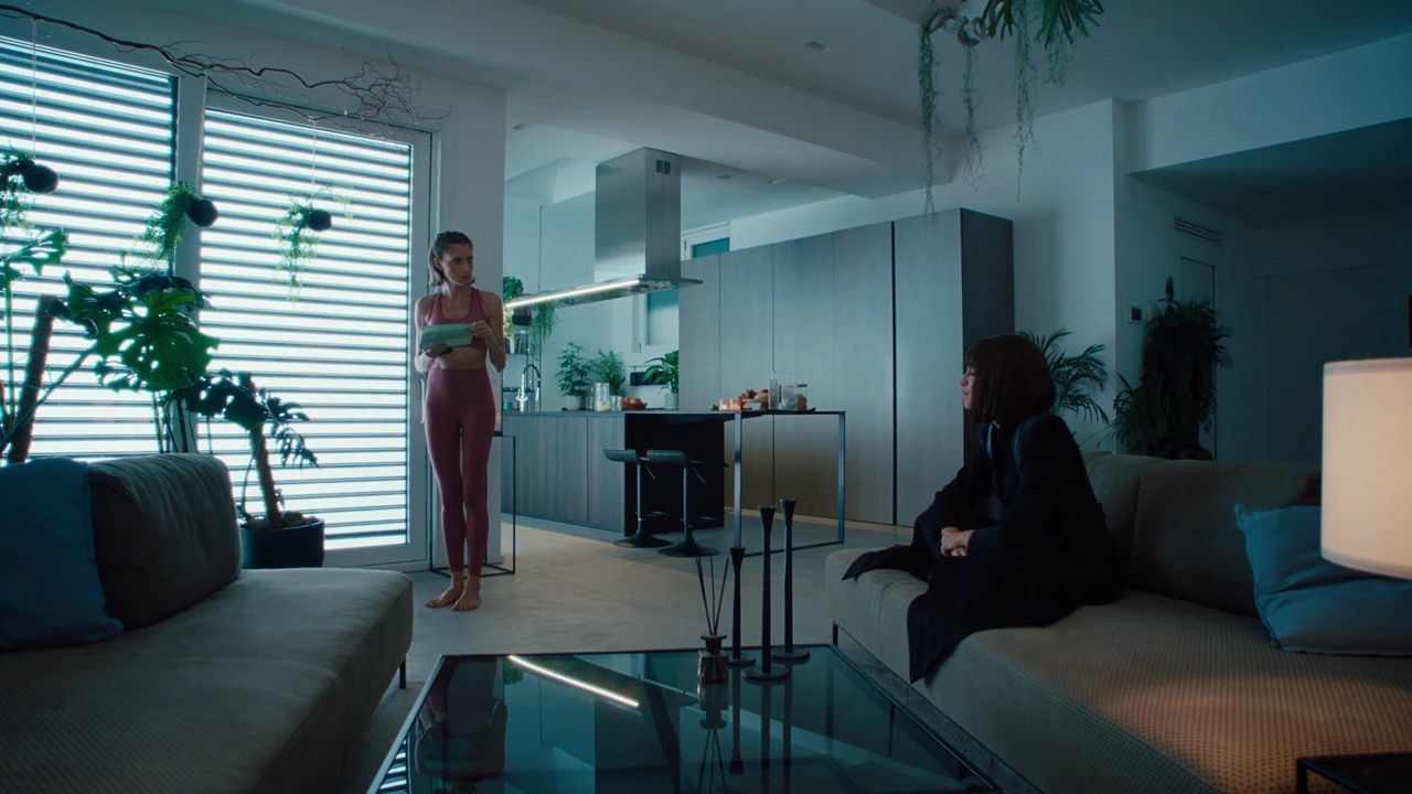 Two women in a cool-lit living room