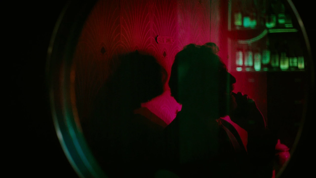 Figures reflected through coloured glass