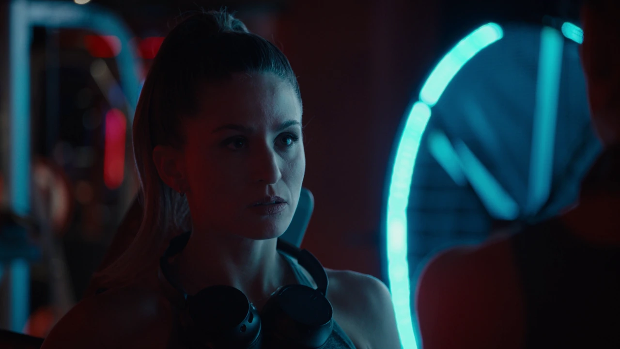 A close-up portrait beside cyan and red light