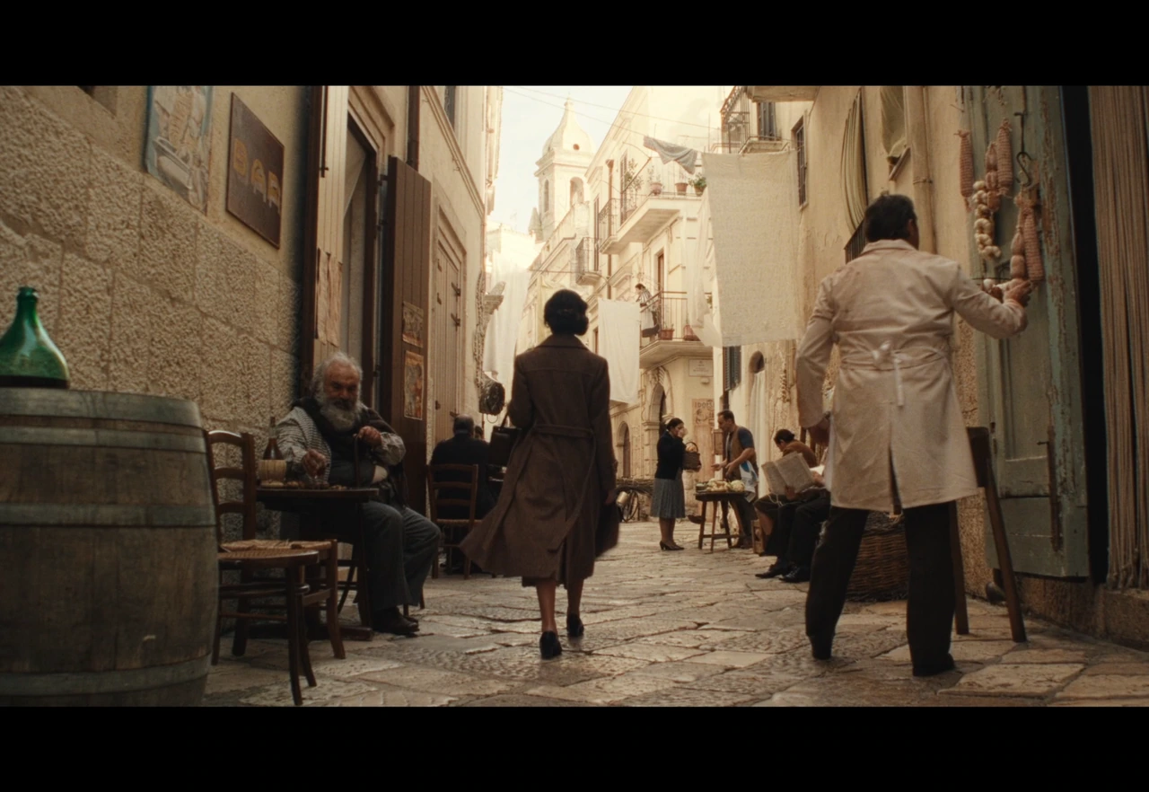 People in a sunlit village street