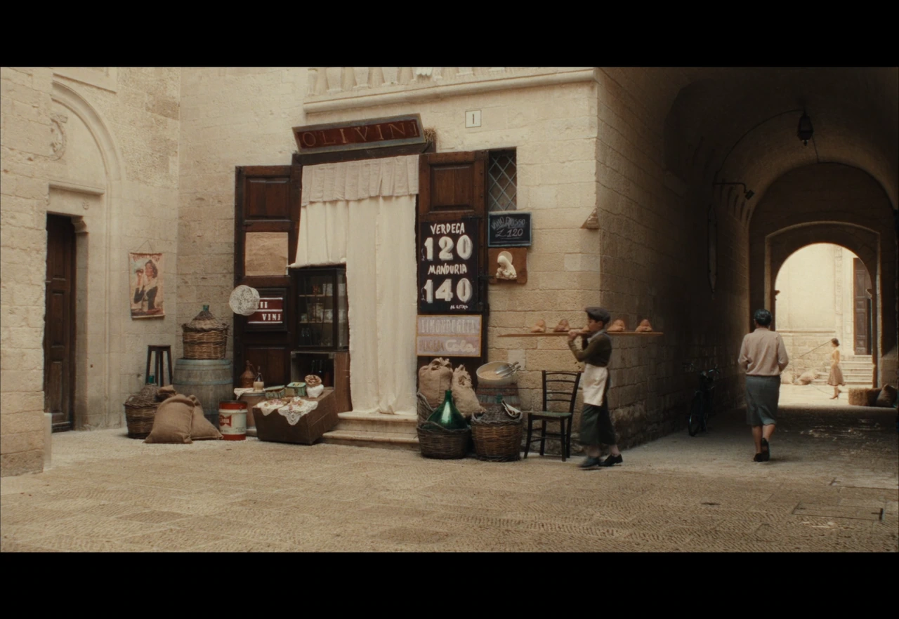A bread delivery beside an old wine shop