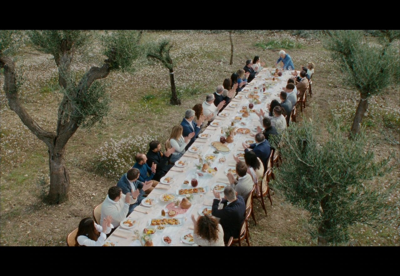 A long table among olive trees